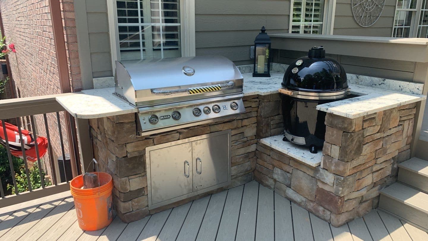 Complete grill station with kamado smoker
